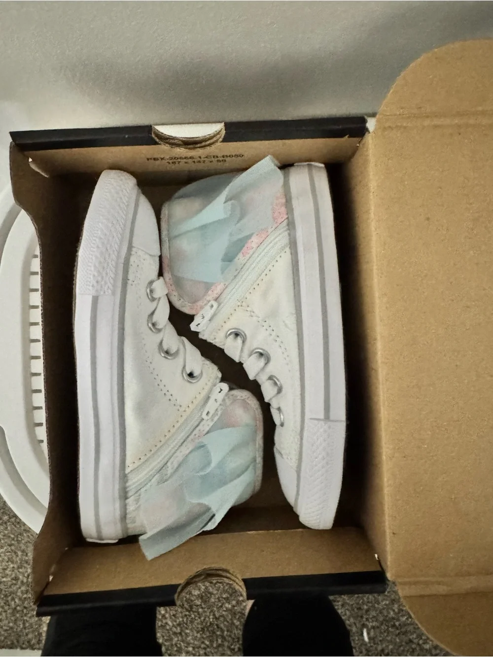 Converse Kids White High-Top Sneakers with Pastel Blue and Pink Accents